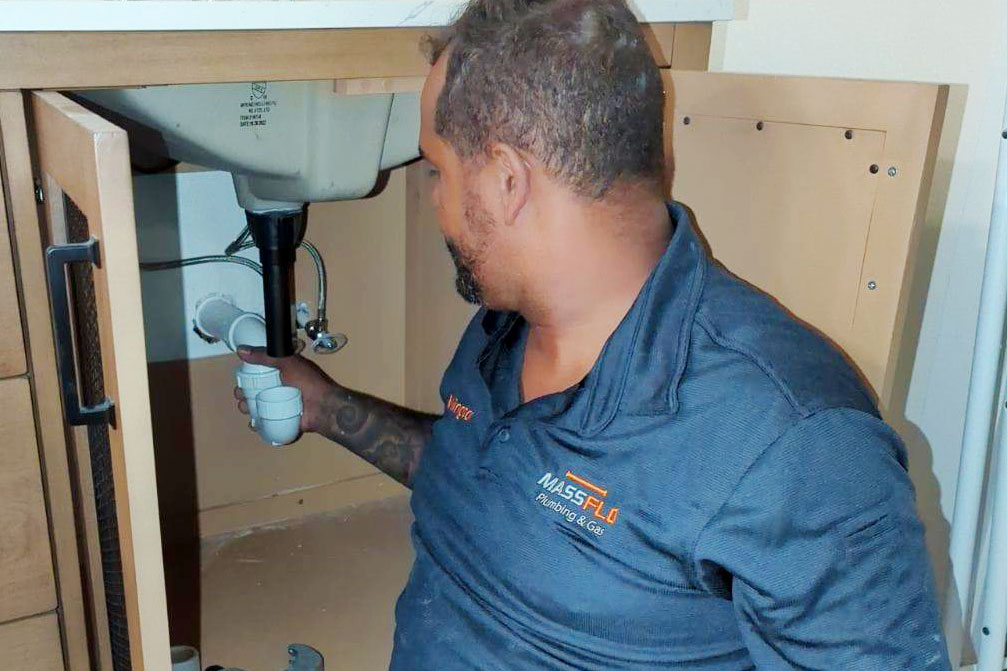 MassFlo technician Wellington performing a professional sewer line repair in a Sarasota, FL residential yard